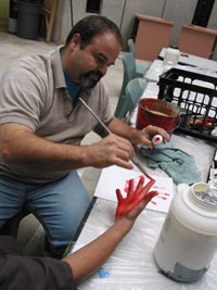 x-handprint-s.JPG (19760 bytes)